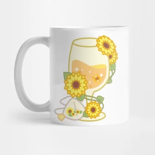 Yellow Sparkling Sunflower Herbal Tea in a Glass Goblet Mug
